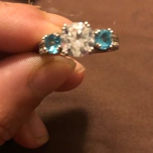 Authentic women’s blue and white topaz ring